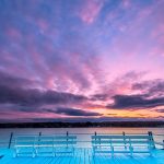 Blue dock at sunset